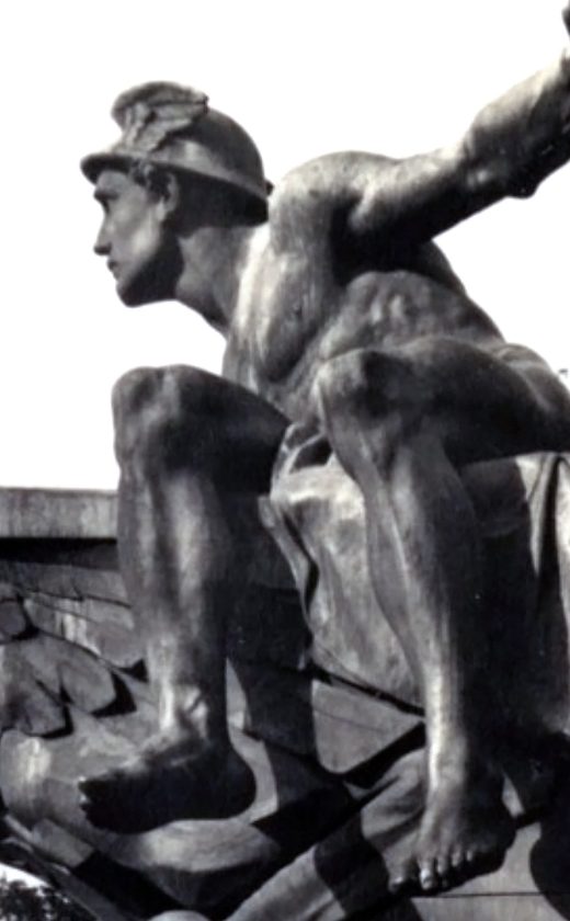 Ciekawy jegomość siedzący na dziobie stylizowanej łodzi, jaką wieńczył nieco przestraszony chyba ptak, trzymający w ręku laskę Eskulapa - symbol zdrowia i medycyny. Na płachcie siedzi sobie Merkury, z charakterystycznym czepkiem ze skrzydełkami. Symbolikę przedstawioną za pomocą skrzydeł w taki właśnie sposób miał też "przodek" Merkurego - grecki Hermes. Tu jako ciekawostkę można dopisać, że Hermesowi skrzydełka dodano znacznie później.